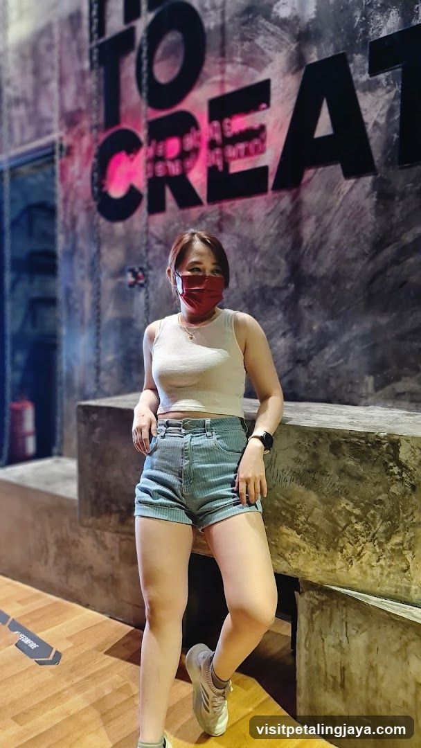 Woman posing in a modern interior space
