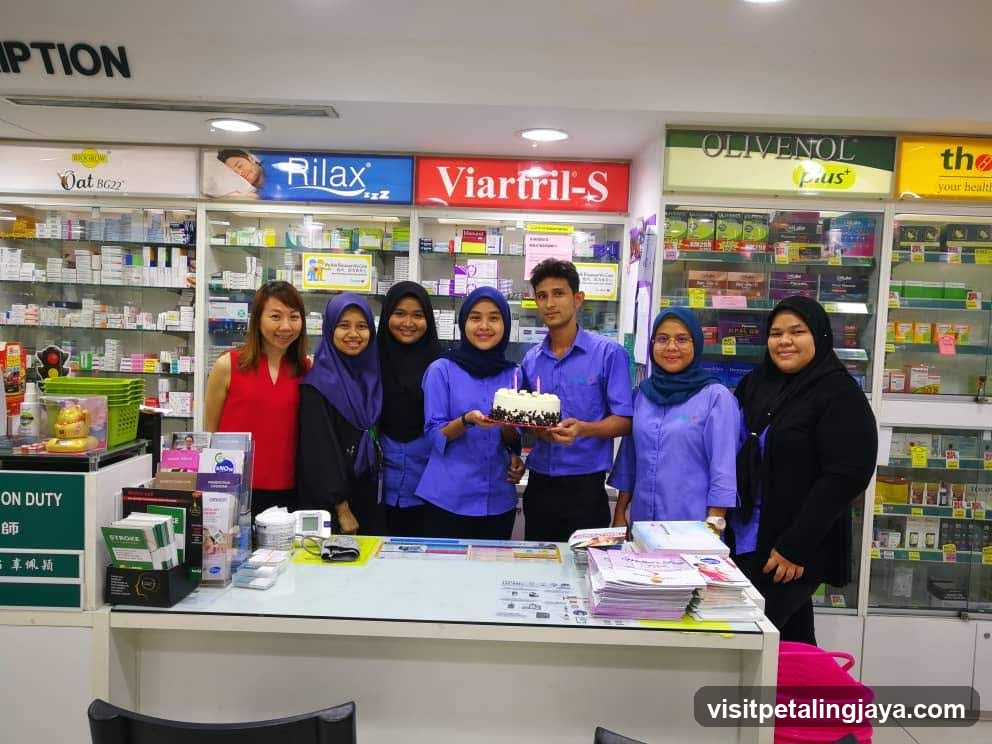 Pharmacy Staff with Cake