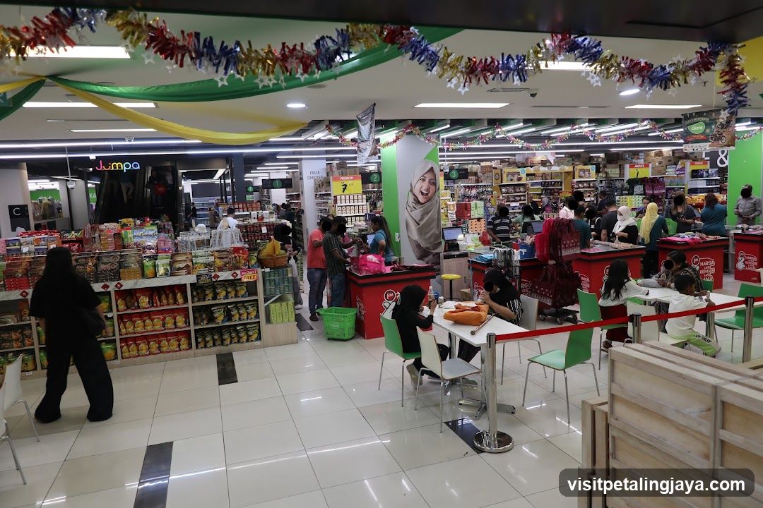 Supermarket Interior with Decorations and Shoppers