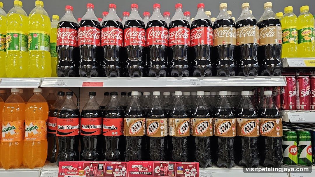 Coca-Cola and A&W Bottles on Shelf