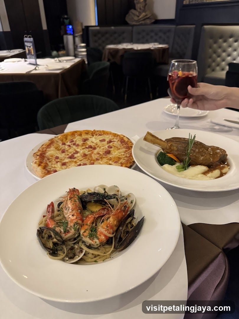 Dining Table with Seafood Pasta, Pizza, and Lamb Shank