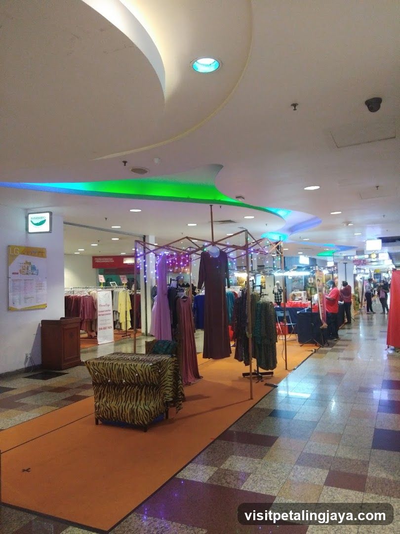 Shopping Mall Interior with Clothing Stall