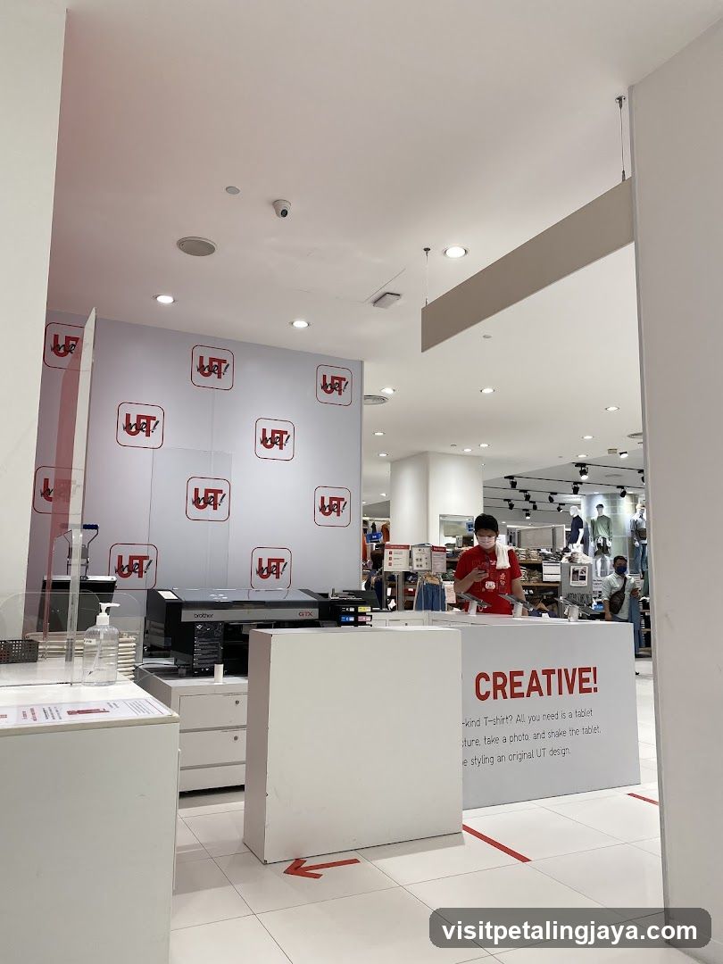 UT Store Interior with Custom Printing Booth