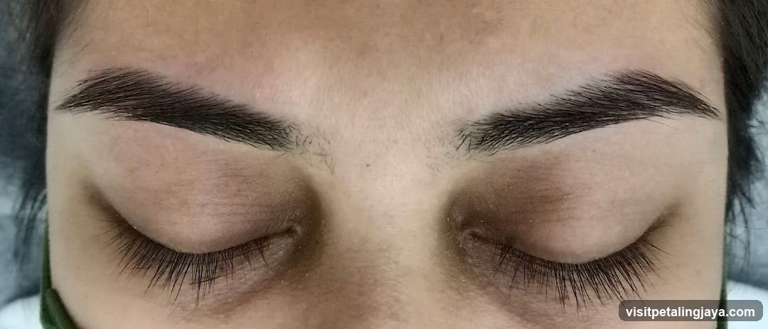 Eyes with closed lids and eyebrows