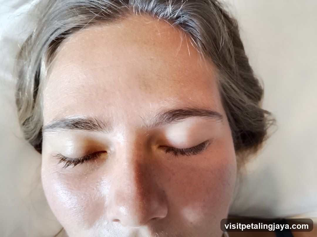 Person lying down with closed eyes
