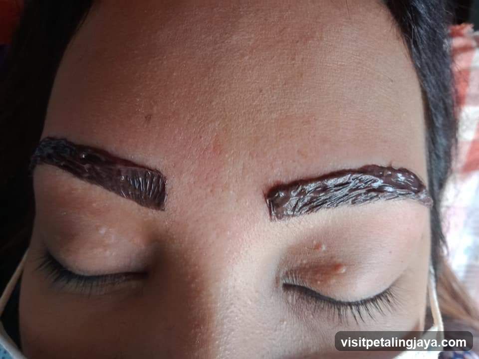 Eyes with eyebrow waxing treatment