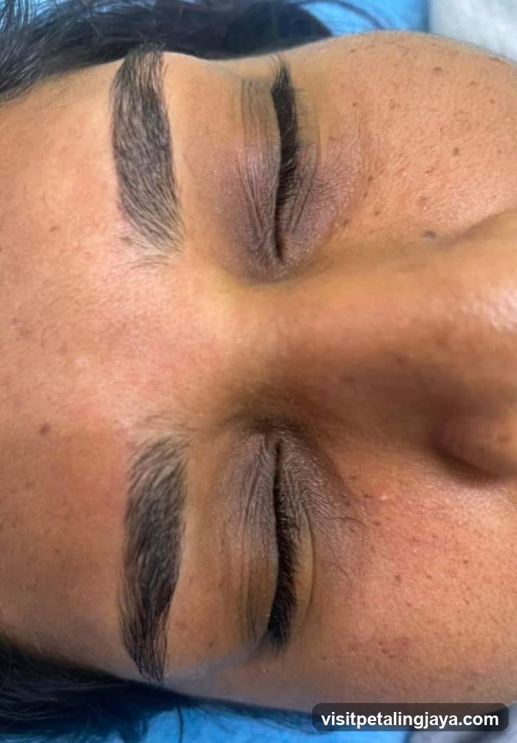 Close-up of a person's face with closed eyes