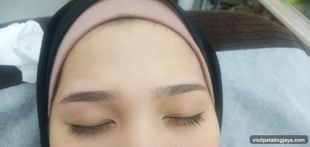 Close-up of a person's face with closed eyes
