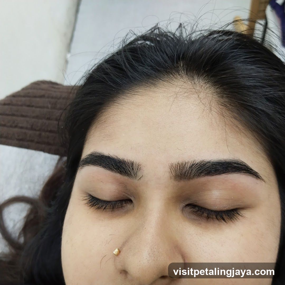 Close-up of a person's face with closed eyes