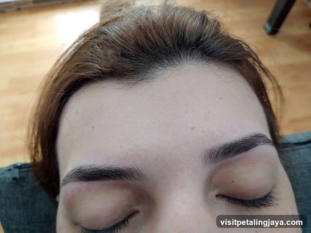 Close-up of a person's face with closed eyes