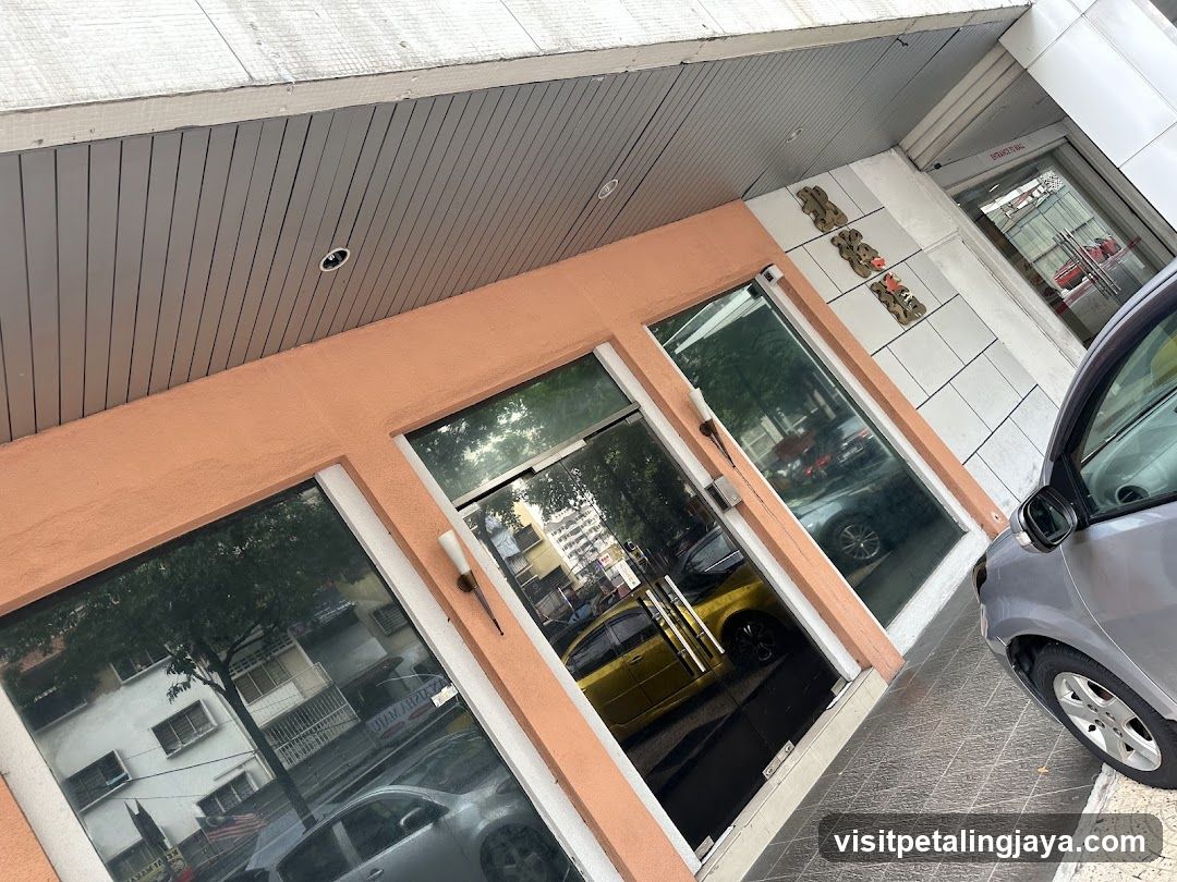 Storefront Entrance with Glass Doors and Signage