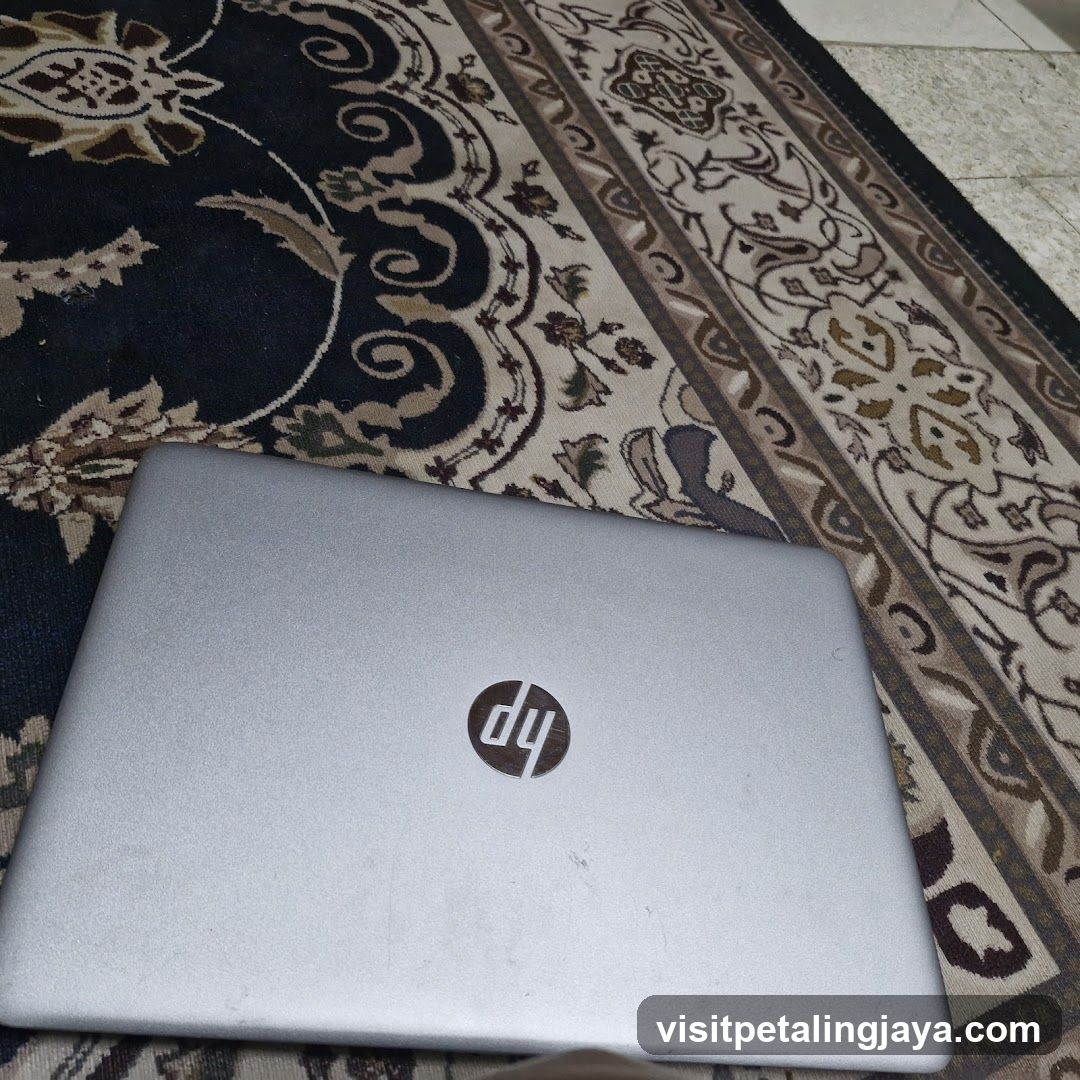 HP Laptop on Rug