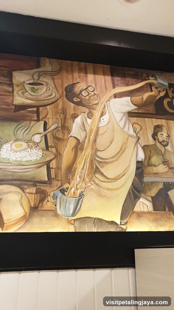 Mural of a barista pouring coffee