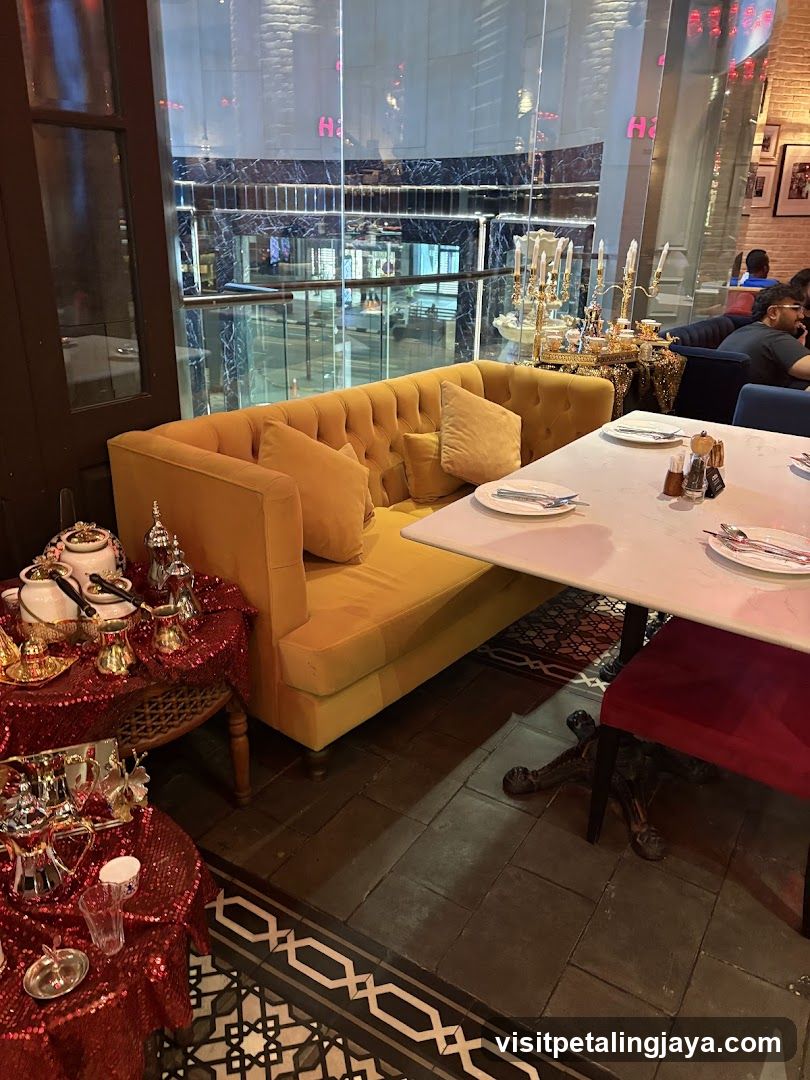 Restaurant Interior with Yellow Sofa and Decorative Table Setting