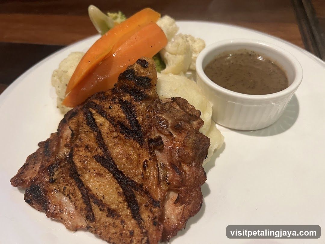 Grilled Pork Chop with Vegetables and Sauce