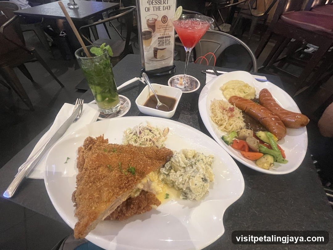 Dining Table with Fried Chicken and Sausages