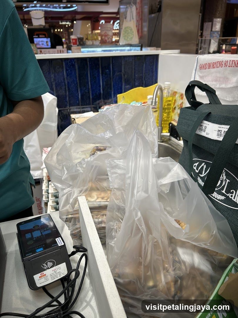 Checkout Counter with Plastic Bags and Payment Terminal