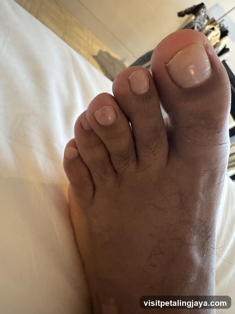Foot on Bed