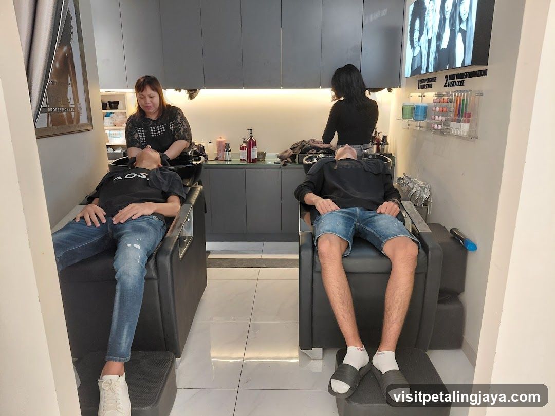 Salon Interior with Two Clients Receiving Hair Services
