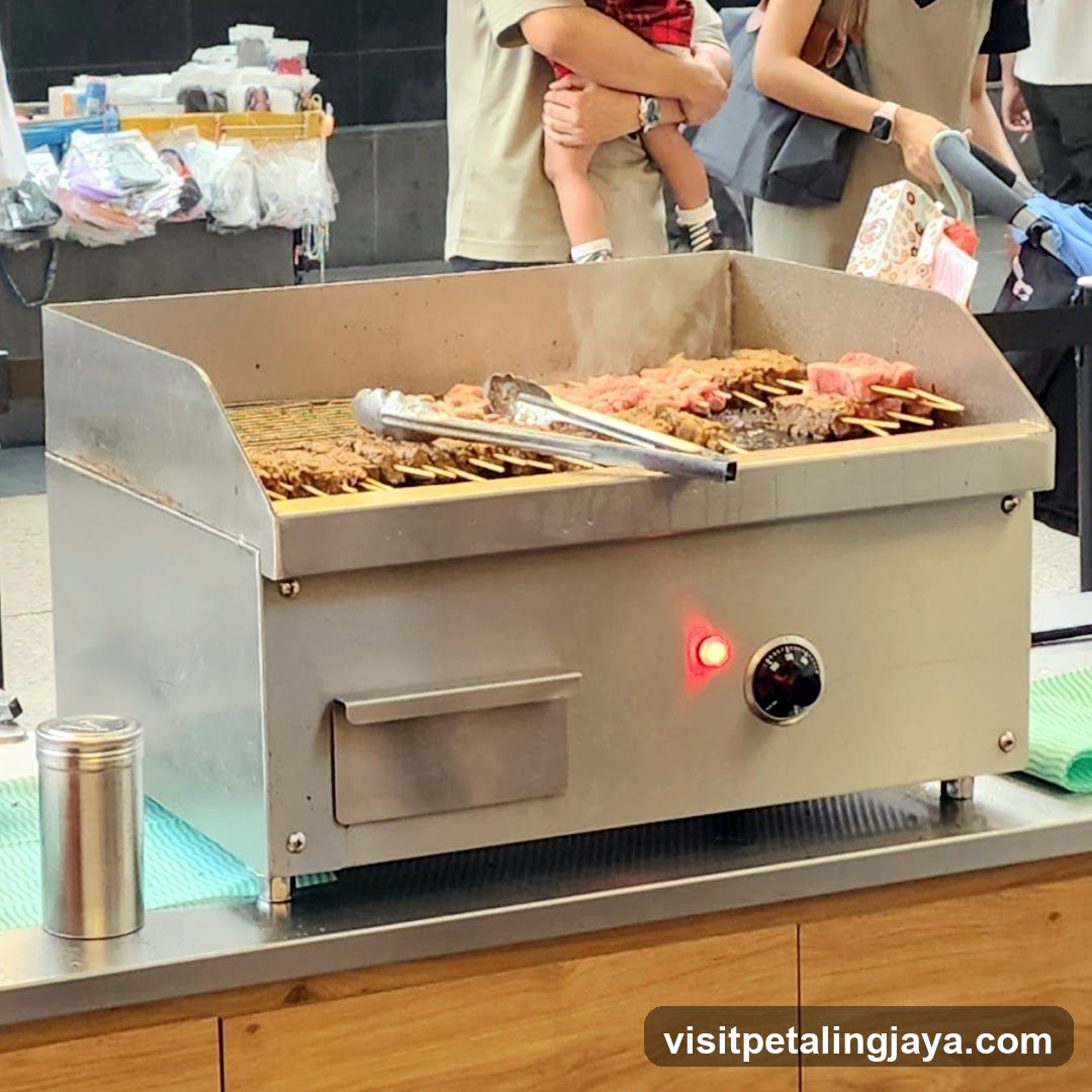 Grill with skewers cooking