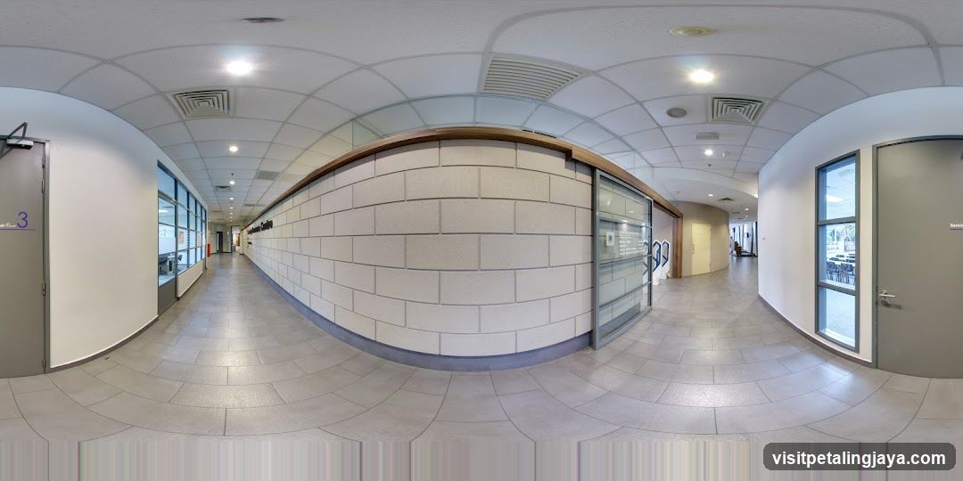 Interior Hallway with Tiled Walls and Glass Doors