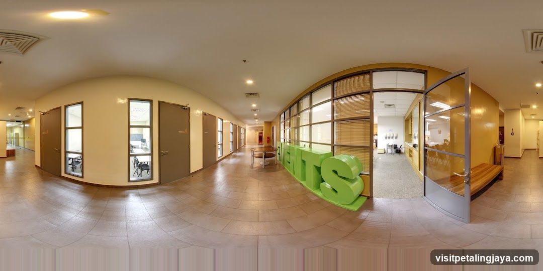 Interior Hallway with Green Signage