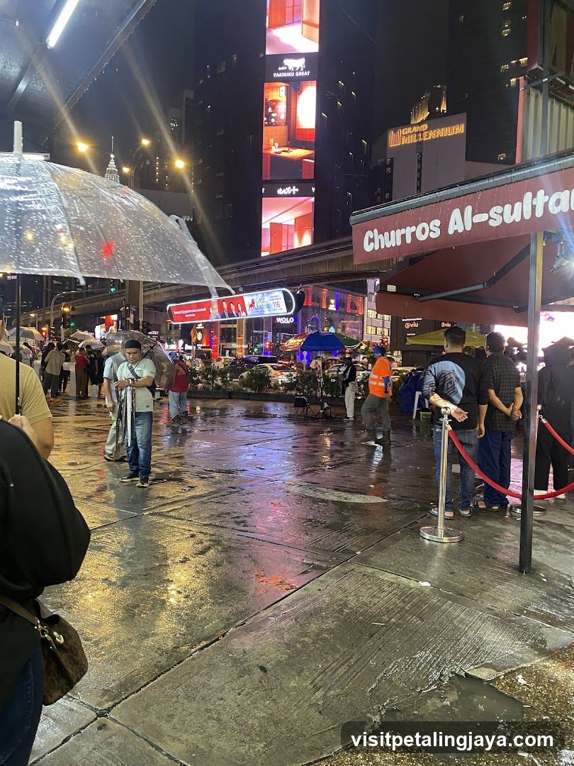 Rainy Night Street Scene with Churros Stand