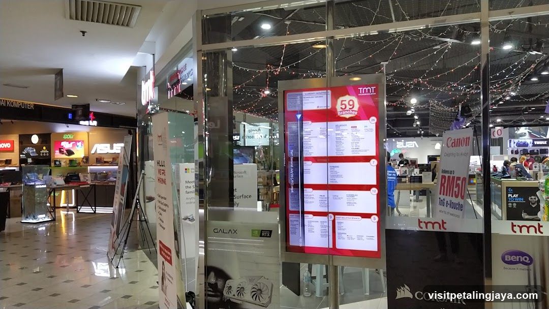Shopping Mall Interior with Storefronts and Displays