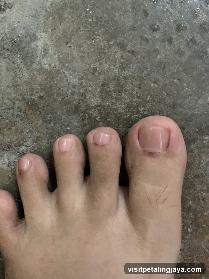 Foot on Concrete Floor