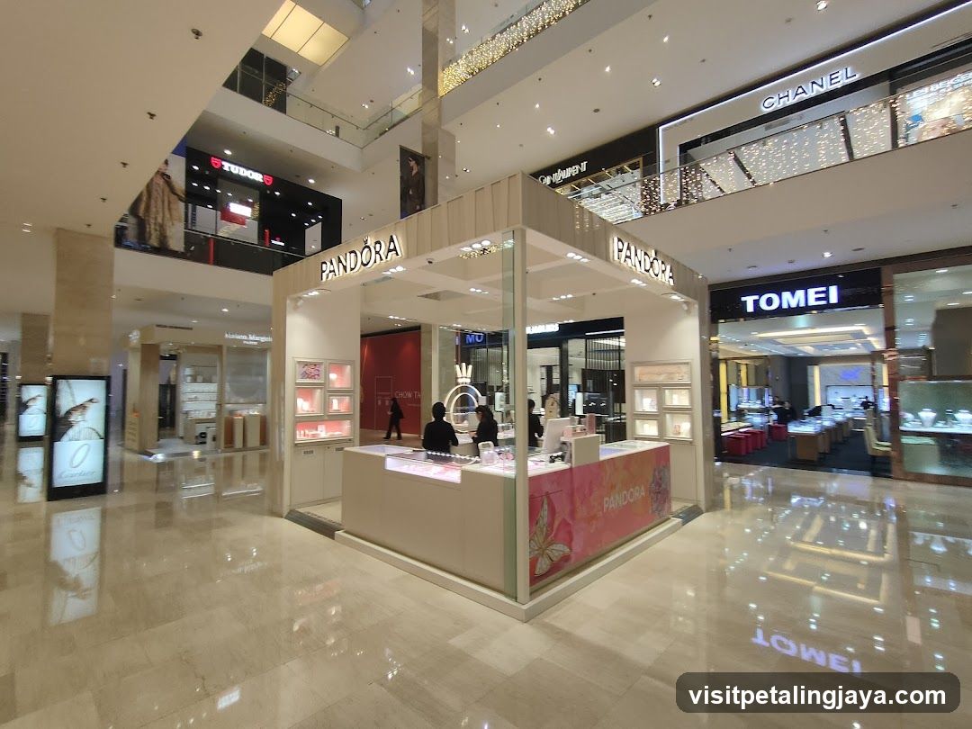 Shopping Mall Interior with Pandora and Tomei Stores