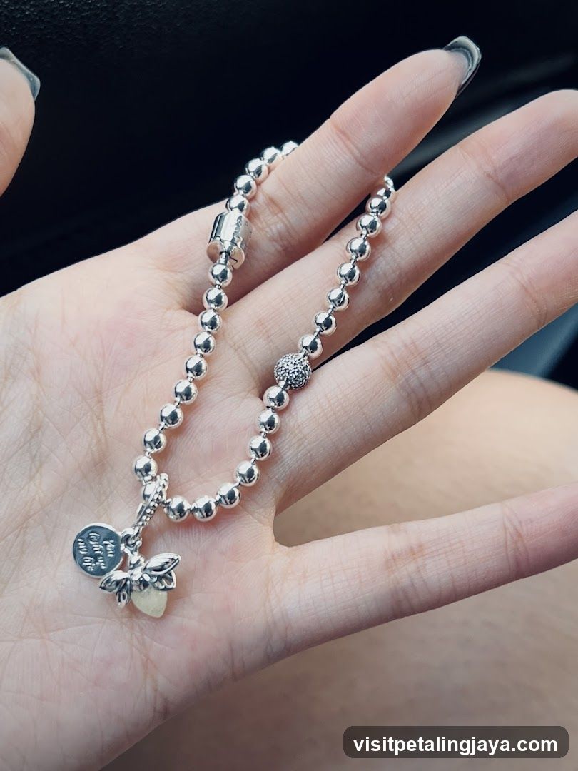 Silver Beaded Bracelet with Butterfly Charm