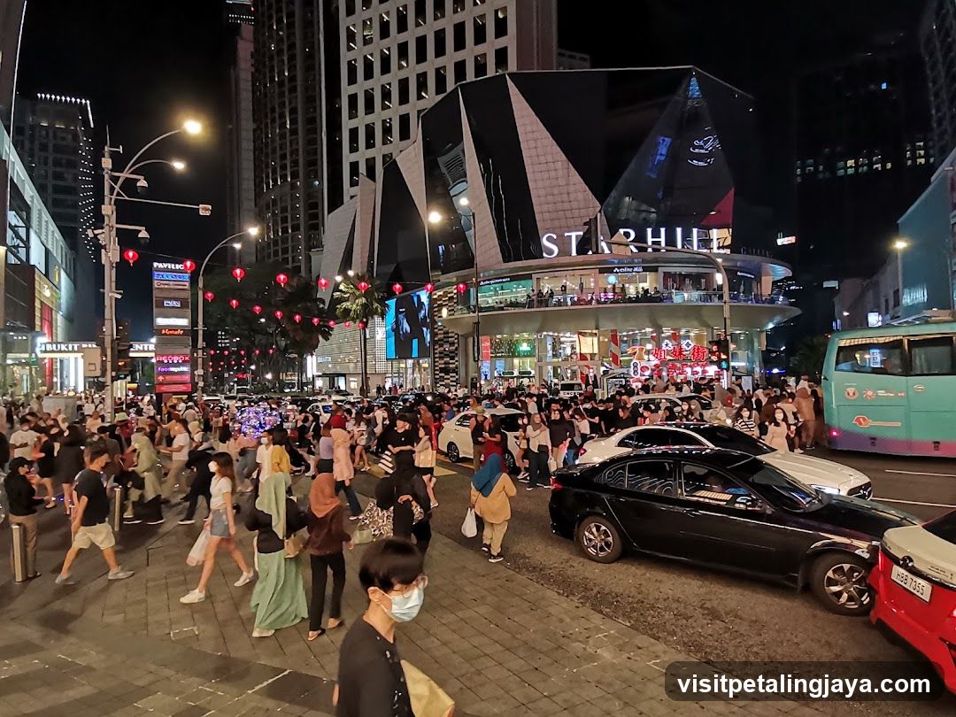 Night Street Scene with Crowd and Cars