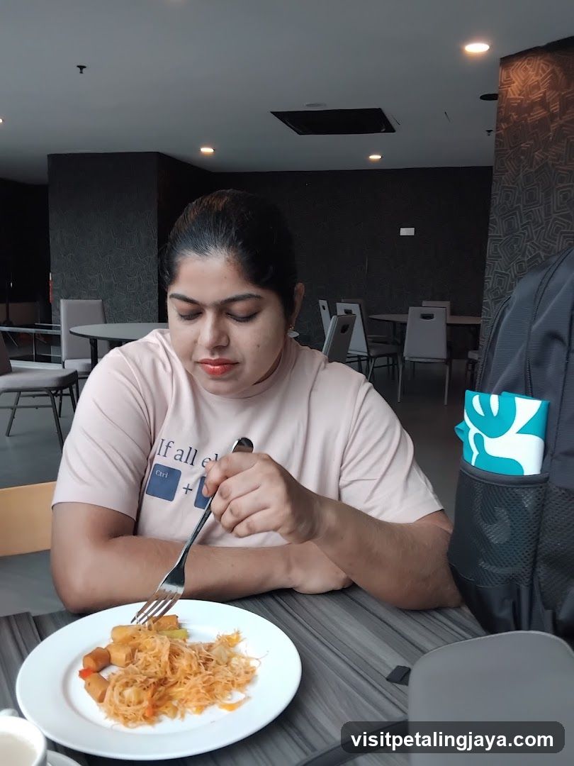 Person eating at a restaurant table