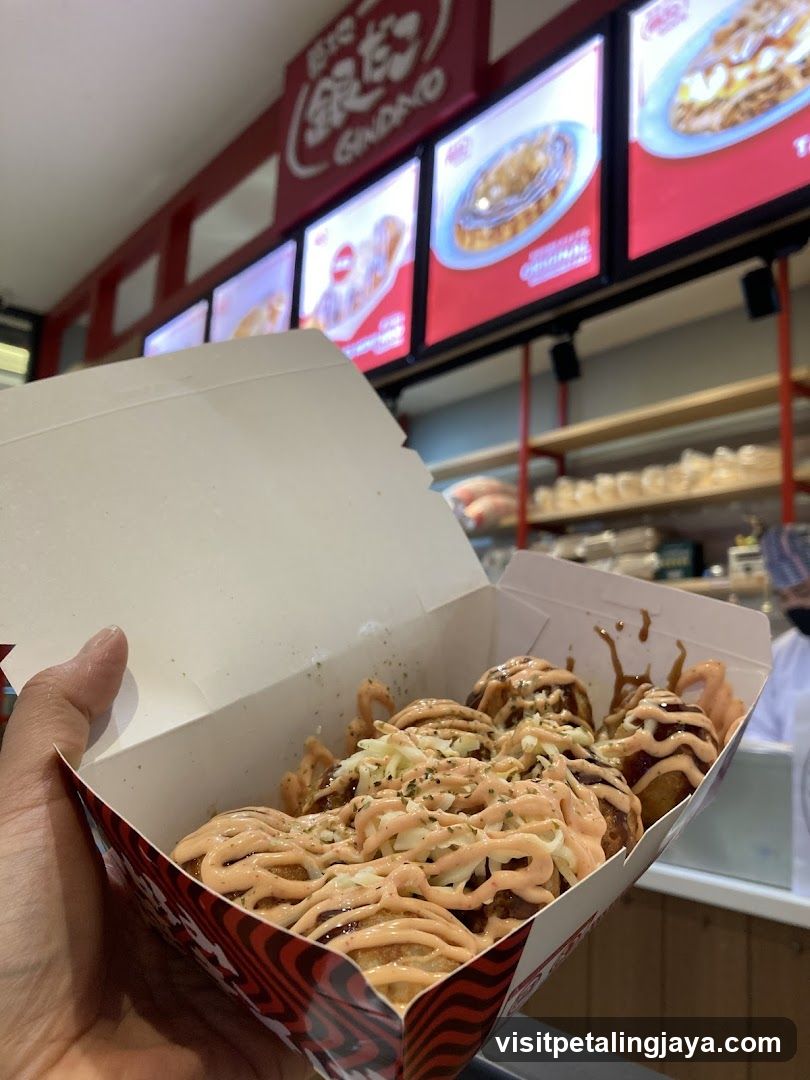Okonomiyaki with sauce and toppings