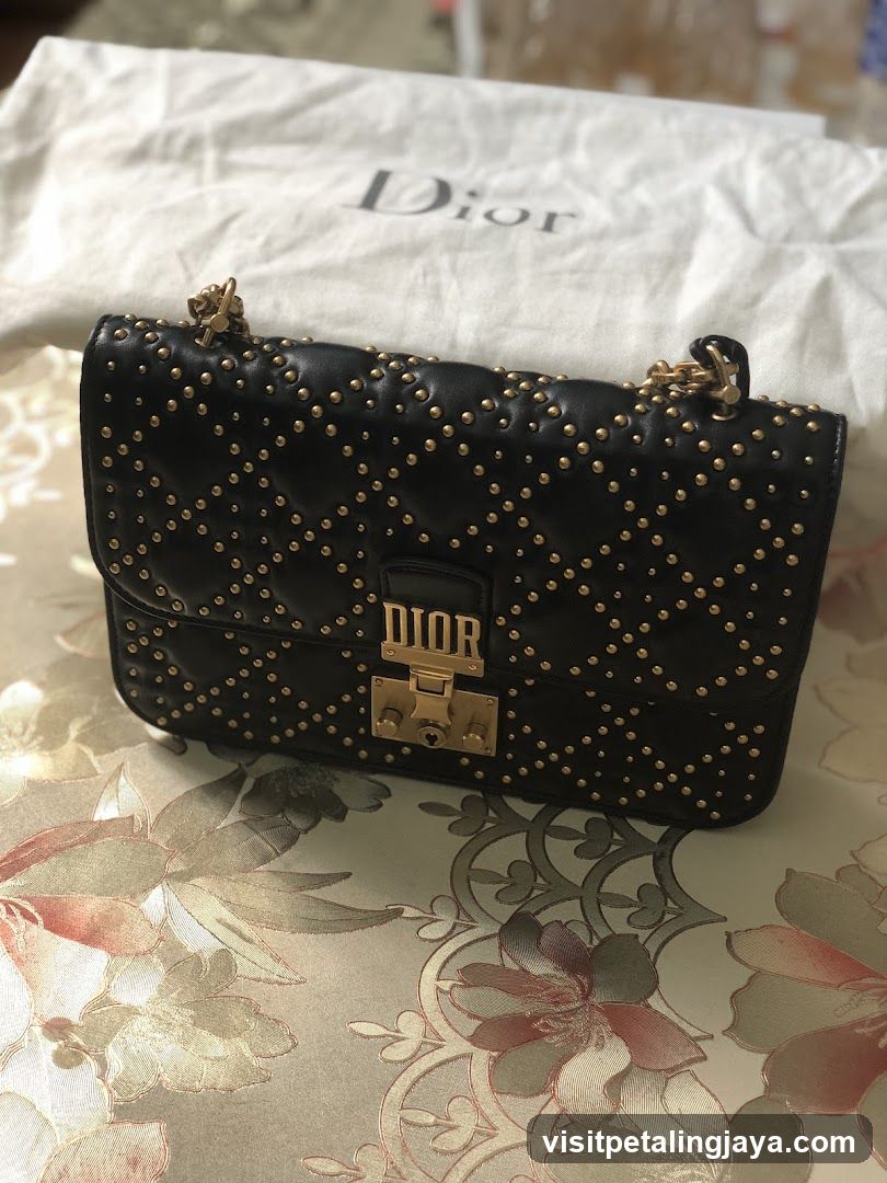Dior Studded Bag on Floral Tablecloth