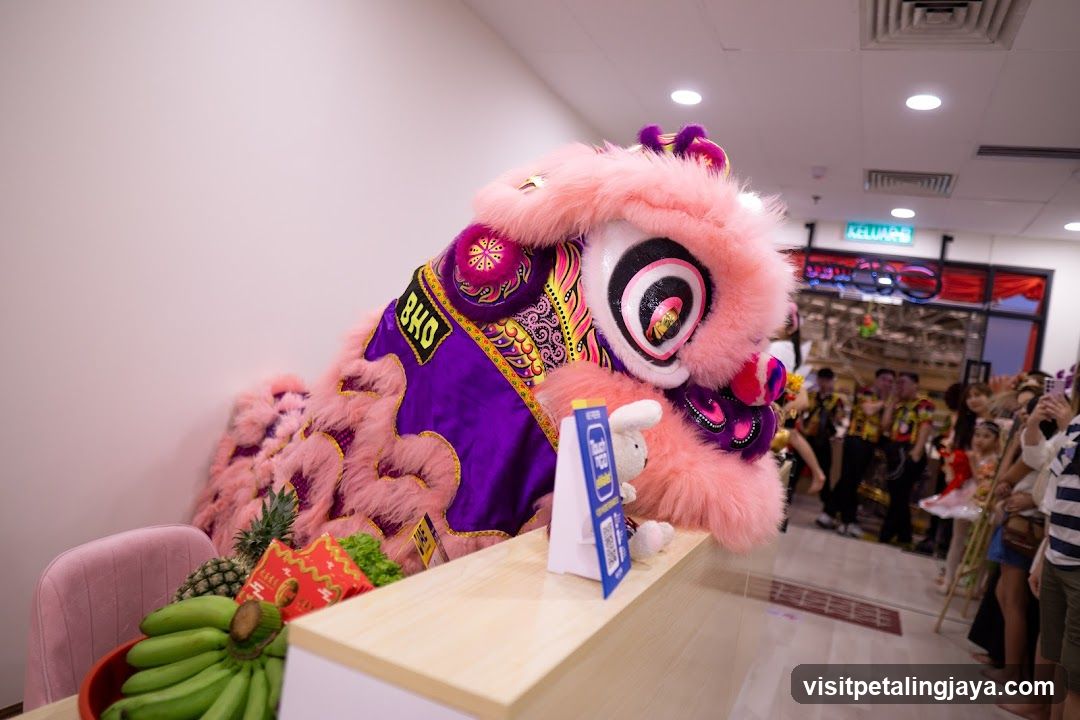 Lion Dance Performance at Shop Entrance