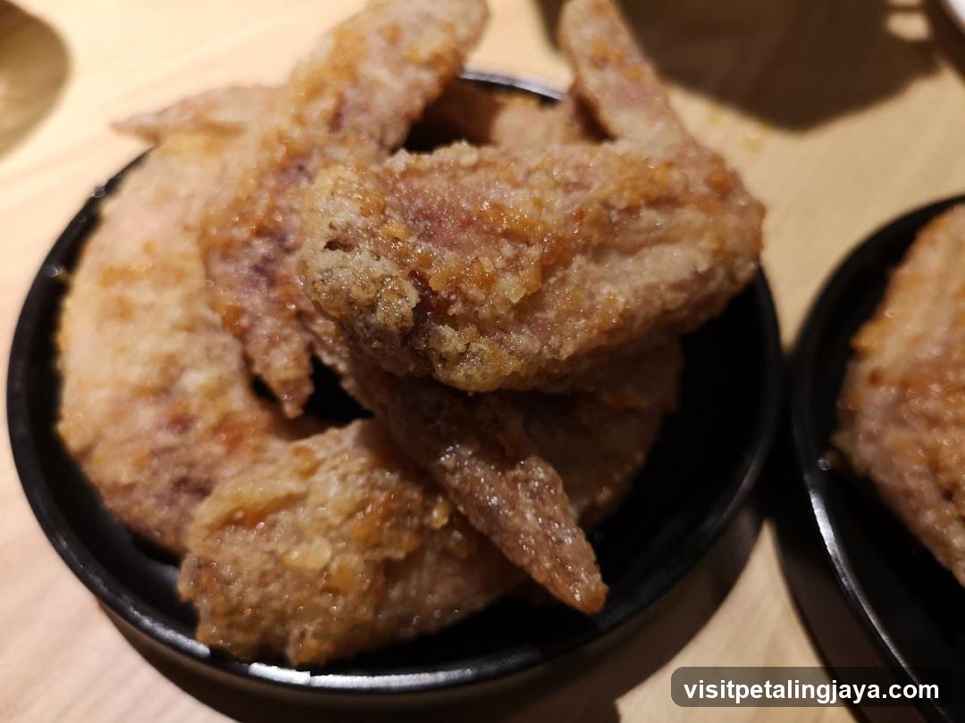 Fried Chicken Wings on Black Plate