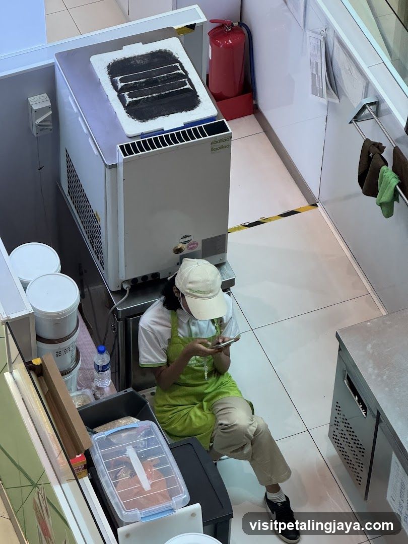 Staff resting in kitchen area
