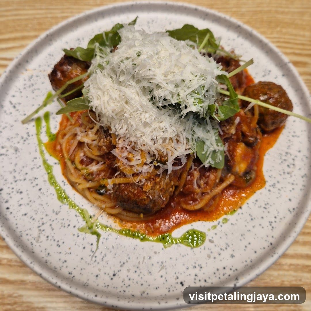 Spaghetti with Meatballs and Arugula
