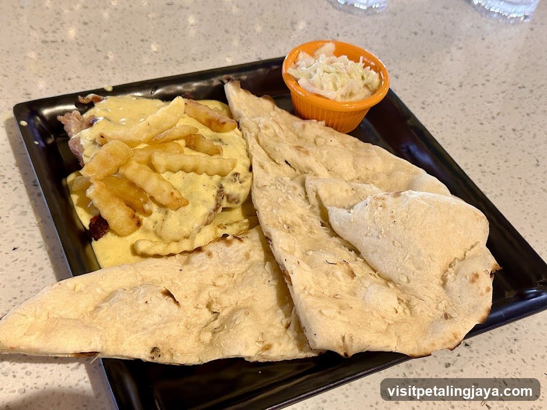 Plate of Food with Fries and Flatbread
