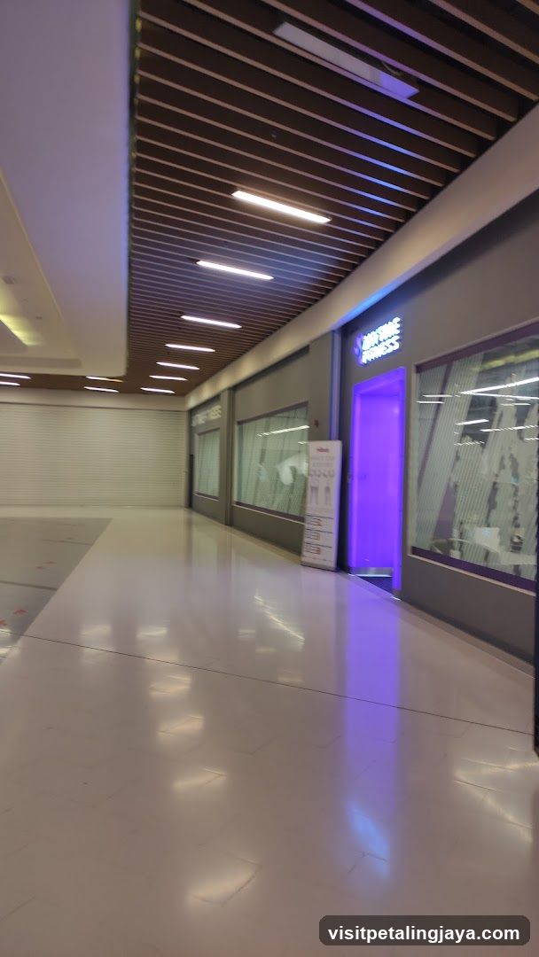 Empty Mall Corridor with Storefronts