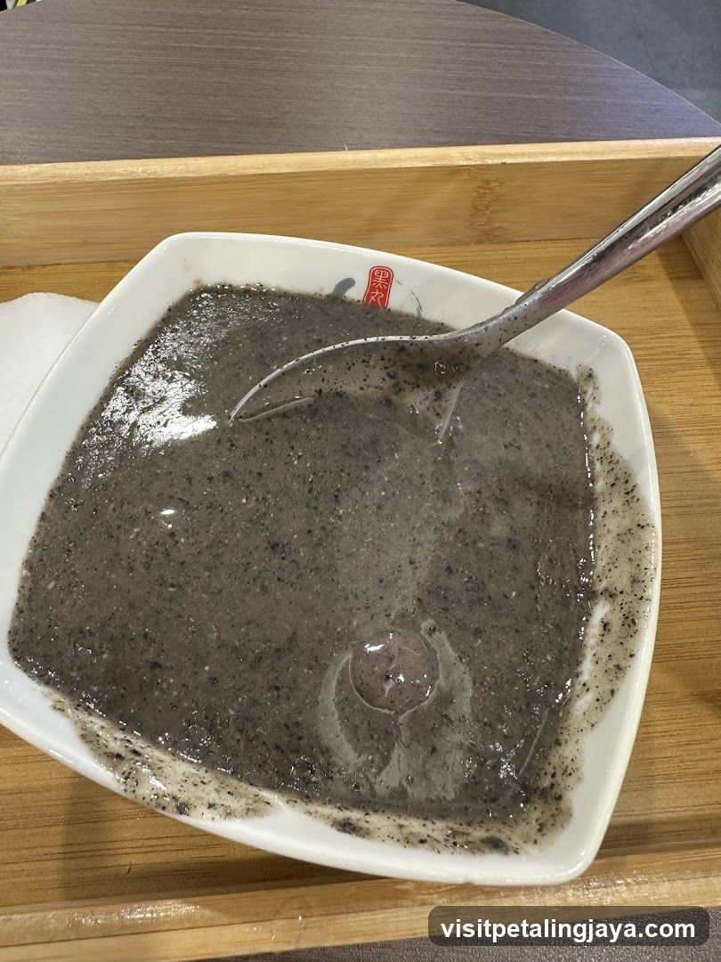 Black Sesame Soup with Blood Sausage