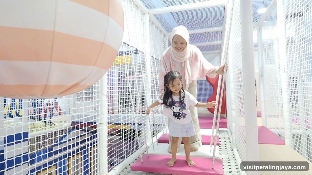 Indoor Play Area with Adult and Child