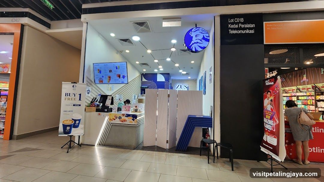 Shopping Mall Interior with Storefronts and Displays