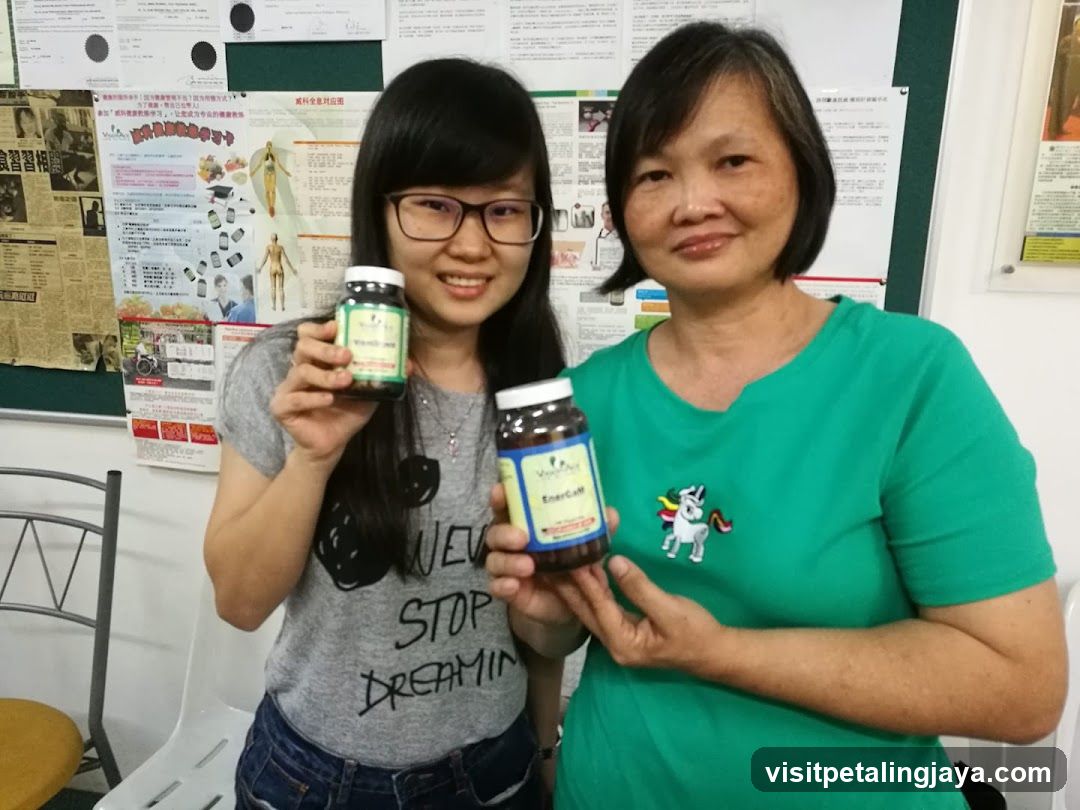 Two women holding jars of supplements