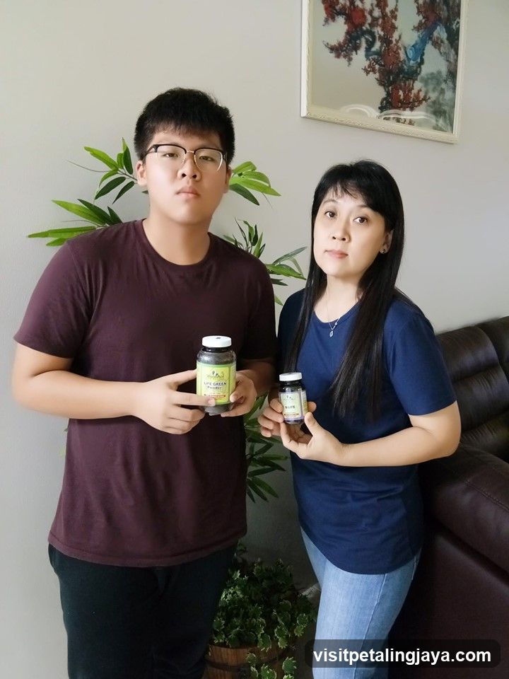 Two people holding supplement bottles