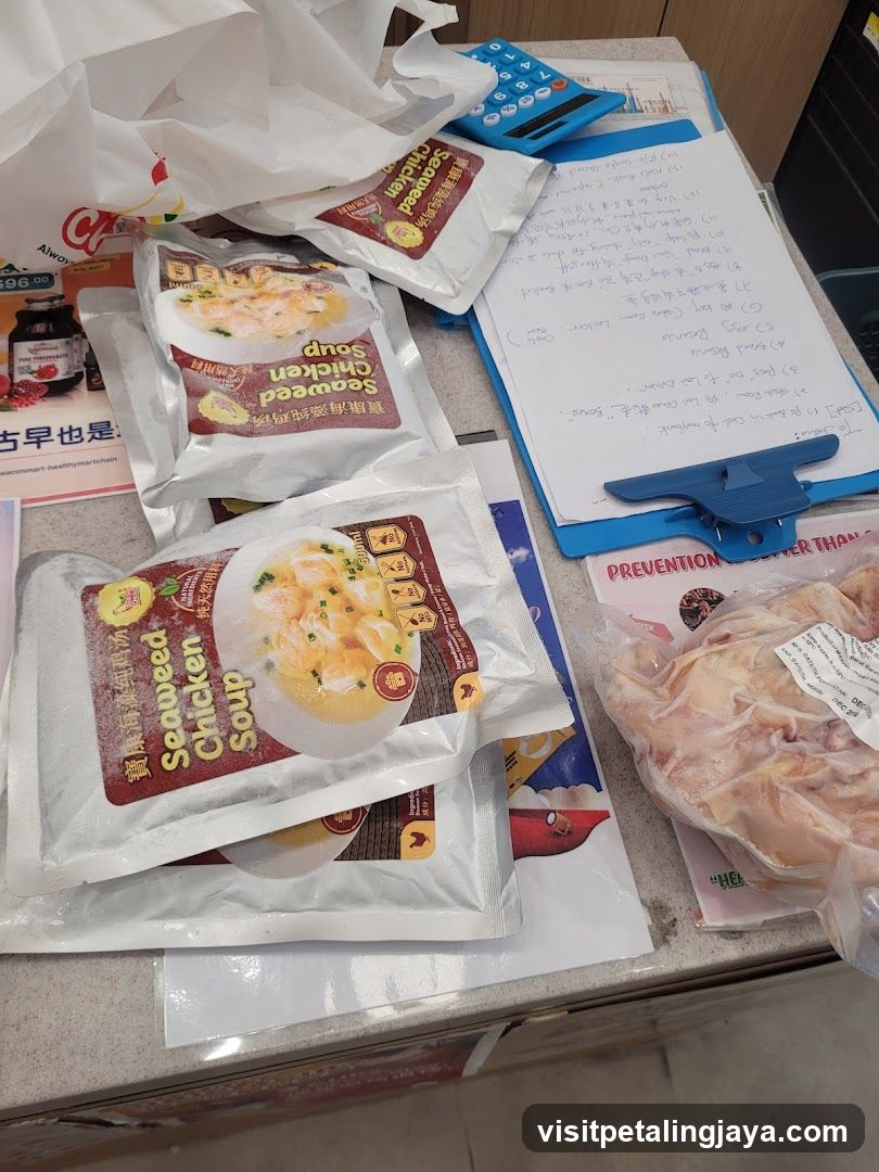 Seaweed Chicken Soup Packages and Raw Chicken on Counter