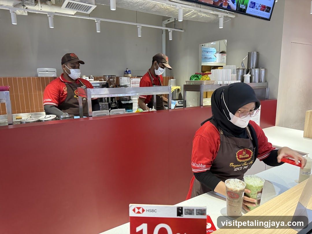 Coffee Shop Interior with Staff