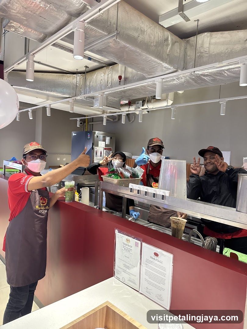 Staff at a food stall or cafe counter