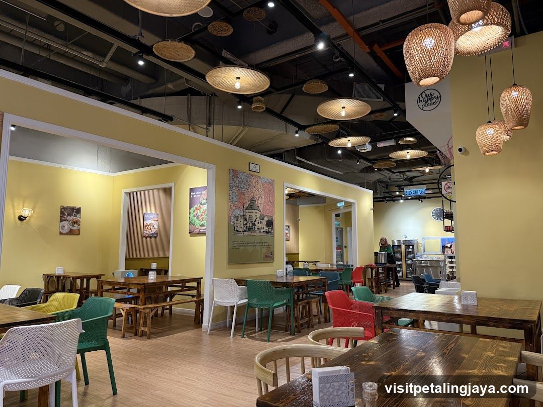Restaurant Interior with Yellow Walls and Hanging Lamps